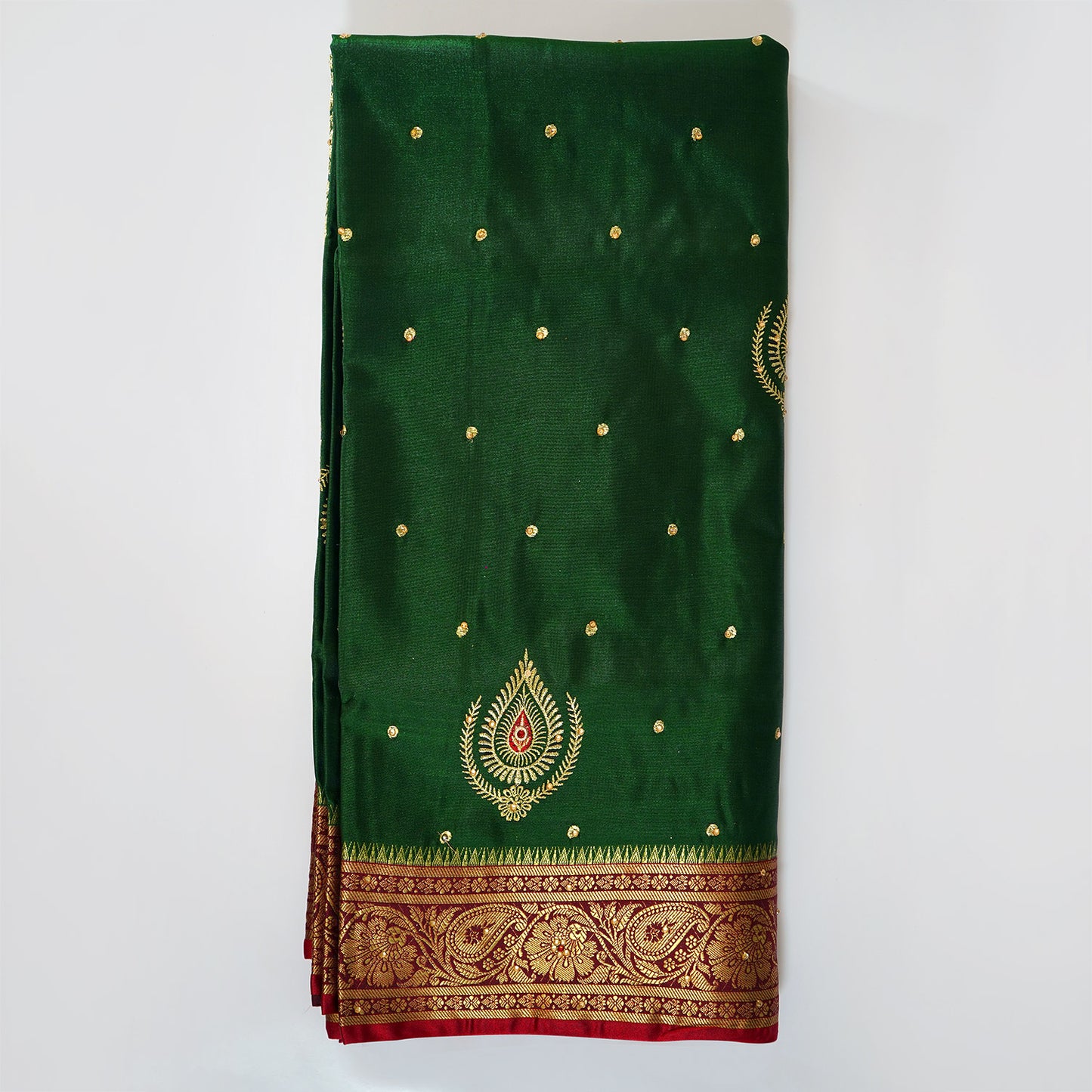 Dark Green Saree, Banarasi Silk, Embroidered Saree, Traditional Indian Wear, Shalu Saree, Ethnic Fashion, Wedding Saree, Festive Attire, Bloomaya.com, Elegant Silk Drapes, Cultural Heritage, Indian Textiles, Timeless Fashion, Special Occasion Outfit, Exquisite Embroidery, Rich Green Hue.